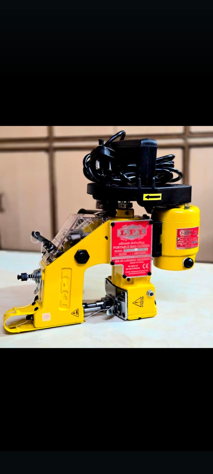 LPI Portable Bag Closer Sewing Machine Model DE-DA — yellow CE certified bag stitching machine, Ahmedabad dealer